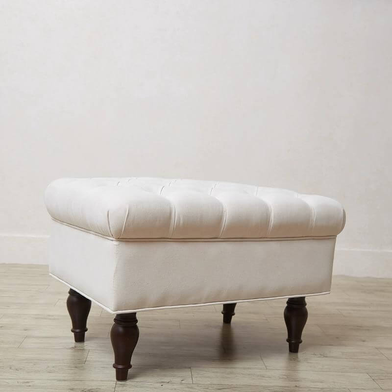 Black legs of modern footstool