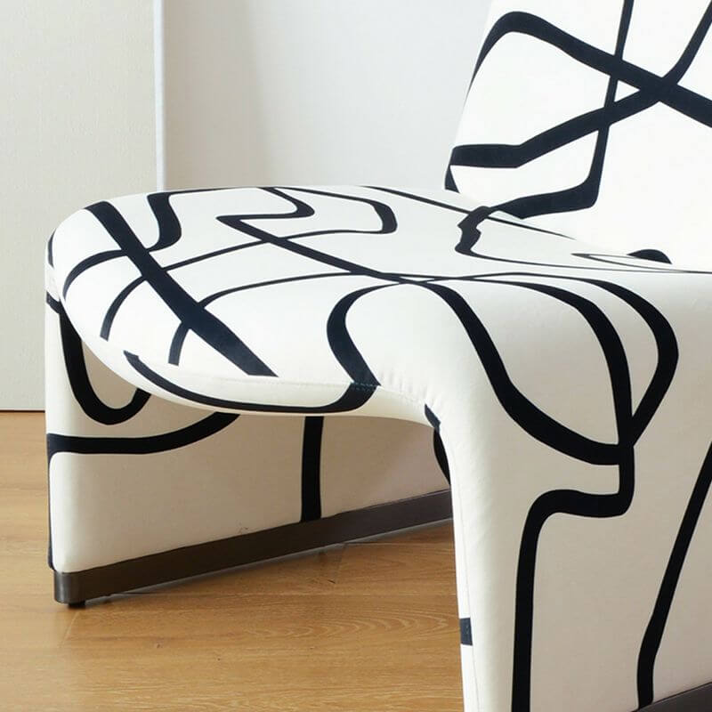 Sleek fixed-back chair in cozy corner