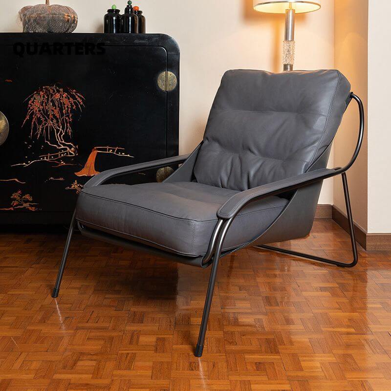 Comfortable dove grey arm chair ambient setting