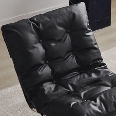 Side view of tufted lounge chair showing reclining feature