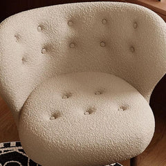 Comfortable and stylish wingback chair in reading nook