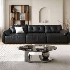 Cozy seating area with black sofa