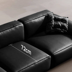 Leather loveseat with armrests in contemporary space