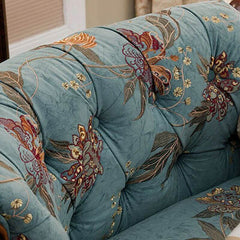 Comfortable seating area on flower-patterned lounge