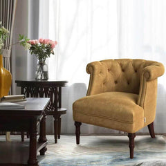 Vintage tufted barrel chair details