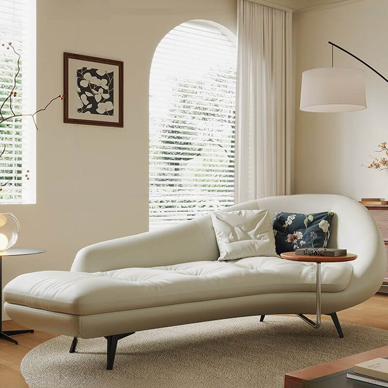 Overstuffed ergonomic chaise lounge in light grey