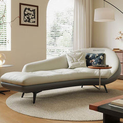 Stylish chaise lounge in beige upholstery