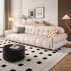 White modern sofa with round arms