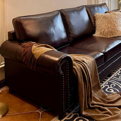 Sofa with nailhead decoration featured in a modern living room