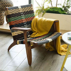 Patchwork arm chair with woven back in tropical style