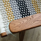 Cozy reading corner featuring the patchwork arm chair