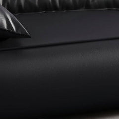 Close-up of Pine Ink sofa's plush pillows and armrest