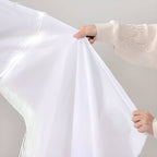 Stylish gray bean bag chair in living room