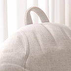 Large light coffee bean bag chair in living room