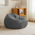 Retro orbicular armless bean bag chair in yellow
