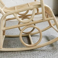 Scandinavian rattan rocking chair in living room