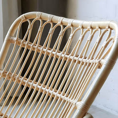 Close-up of rattan weaving on rocking chair