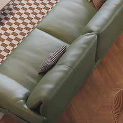 Six-seater olive green couch in cozy setup