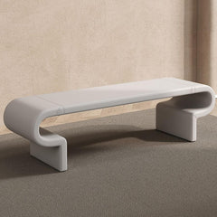 Simple gray bench seat in an entryway