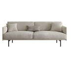Simple grey upholstered sofa in a modern living room