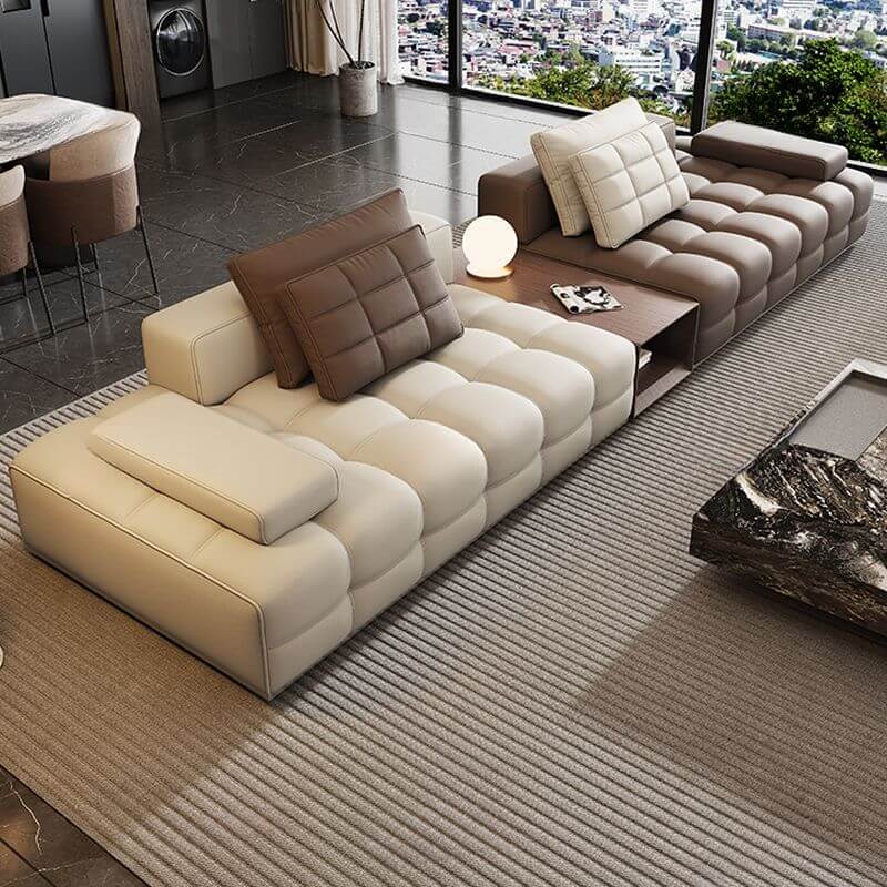 brown floor sofa with two pillows