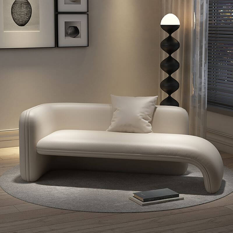 Close-up of chaise lounge arm and cushion