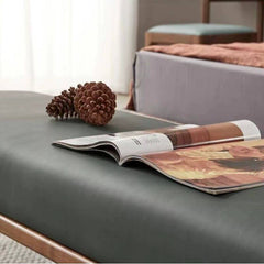 Contemporary upholstered bench by the bed