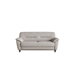 Lounge area featuring elegant dove grey couch