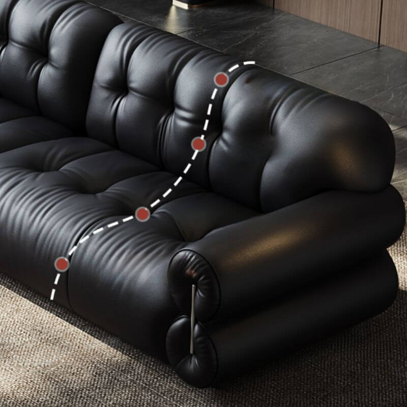 Minimalist black sofa in bright interior