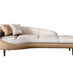 Elegant cream chaise lounge with pillows