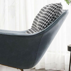 Simplistic cushioned rocking chair in blue houndstooth