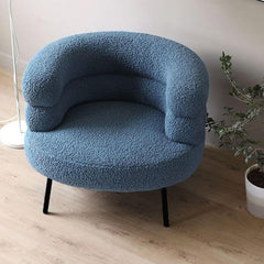 Comfortable barrel chair profile