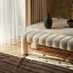 Stylish accent bench at the foot of a bed