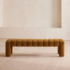 Velour cushioned bench in beige color