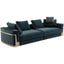 Minimalist dark blue couch on wooden floor