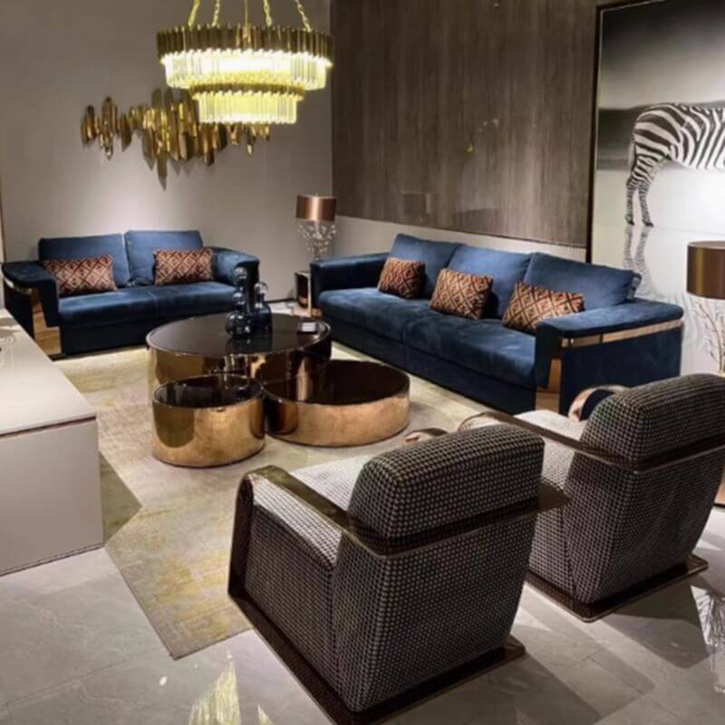 Comfortable dark blue sofa with cushions