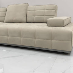 Stylish modern sofa with minimalist décor around it