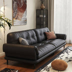 black sofa with pillows