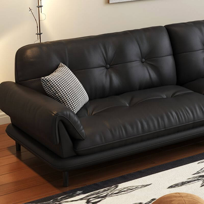 cozy living room setup with black sofa