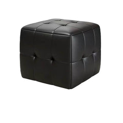 Black pouf with tufted design