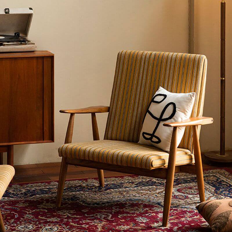 Simplistic striped yellow accent chair side view