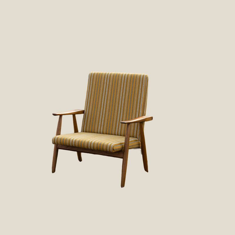 Living room setup featuring a yellow accent chair