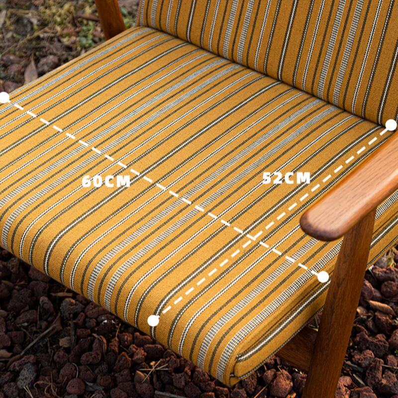 Bright and inviting yellow chair in a modern setting