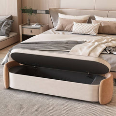 Orange upholstered indoor bench with storage