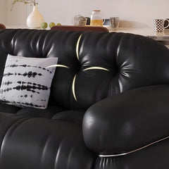 Midnight black floor sofa with armrests