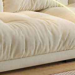 Close-up of cushion details on off-white sofa