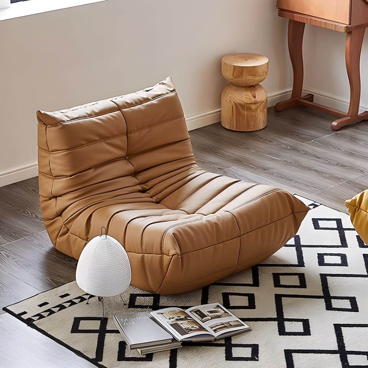 Sleek orange bean bag lounger on a modern living room floor