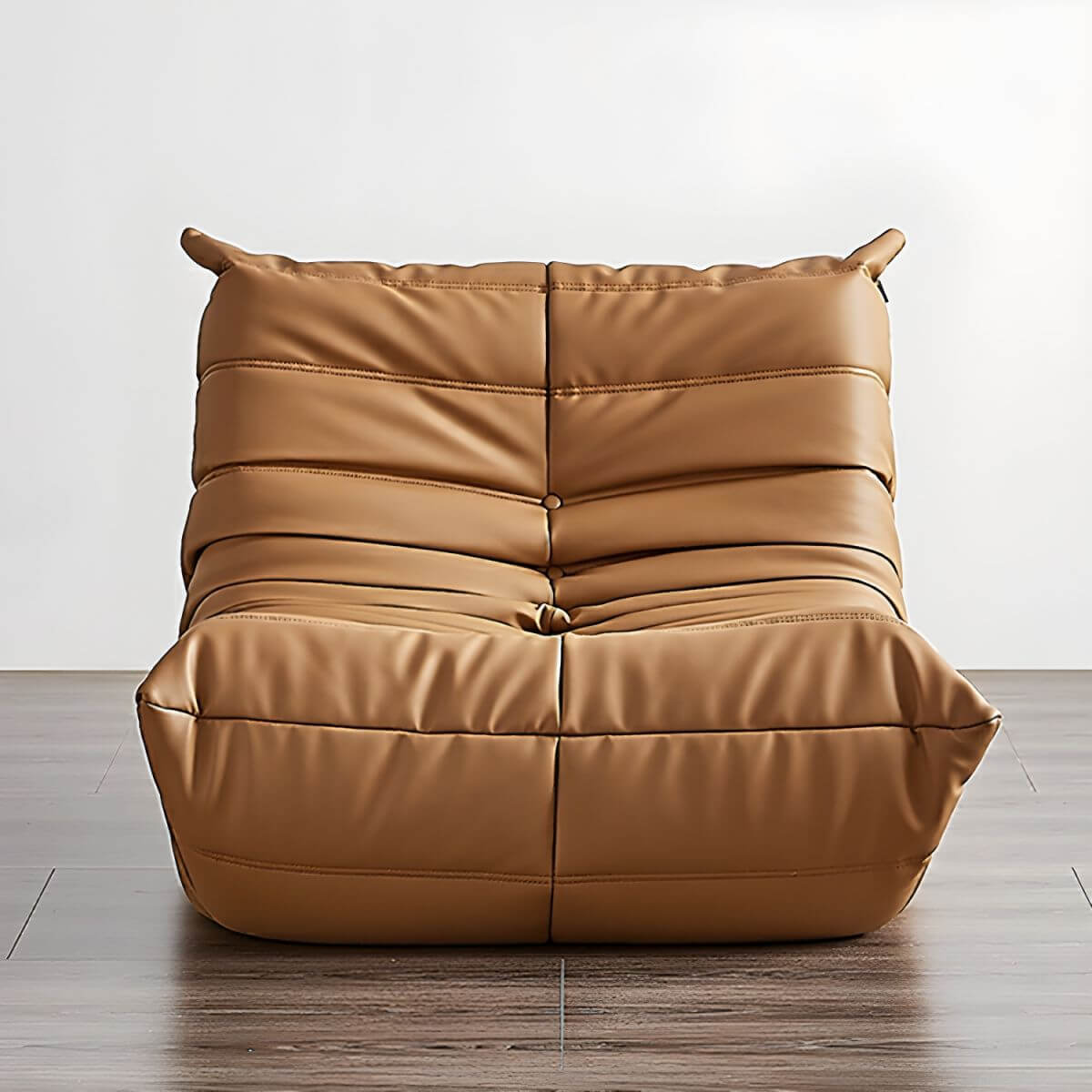 Waterproof faux leather orange bean bag chair in a cozy corner