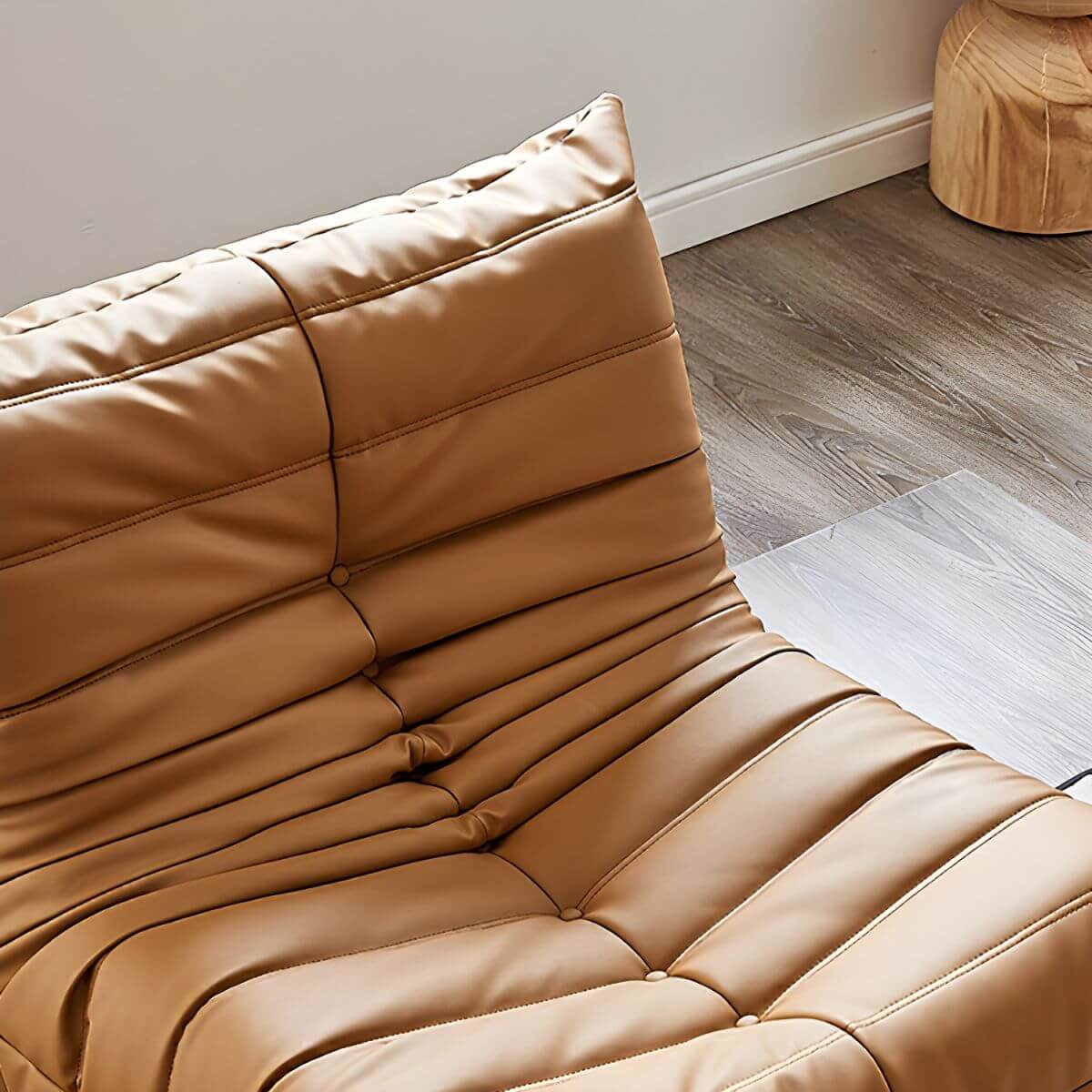 Close-up of the stylish orange sponge bean bag lounger