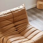 Close-up of the stylish orange sponge bean bag lounger